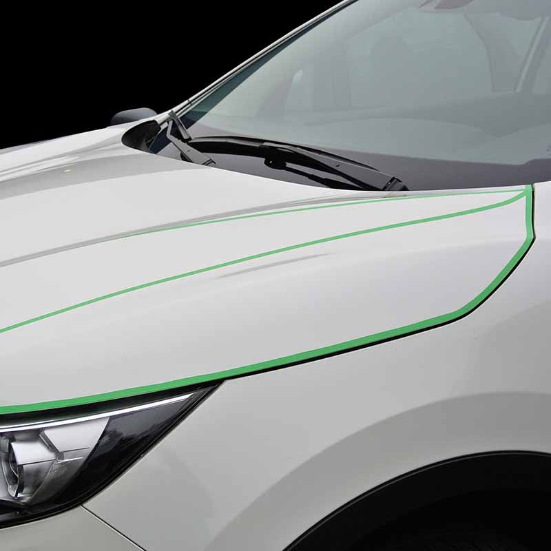 Colad Fine Line Tape applied to a white car hood