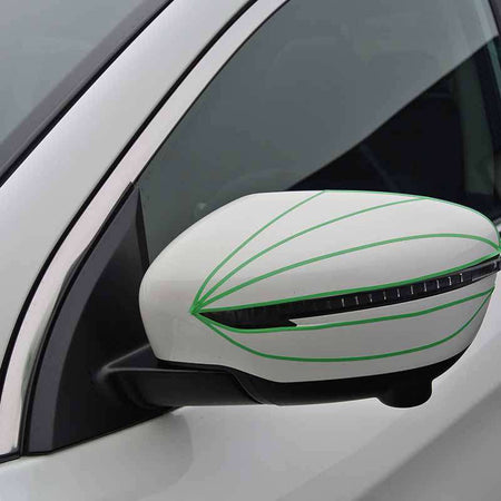 Colad Fine Line Tape applied to a driver's side mirror