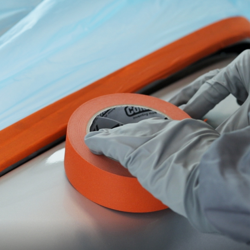 Colad Orange™ Masking Tape being applied
